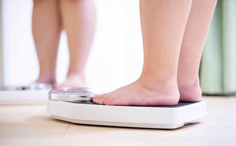 Feet on weighing scales