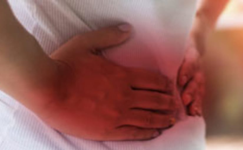 Hands on painful abdomen